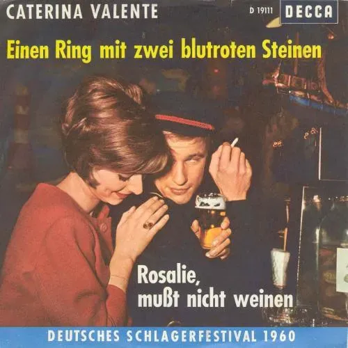 Valente Caterina - Einen Ring mit zwei blutroten Steinen